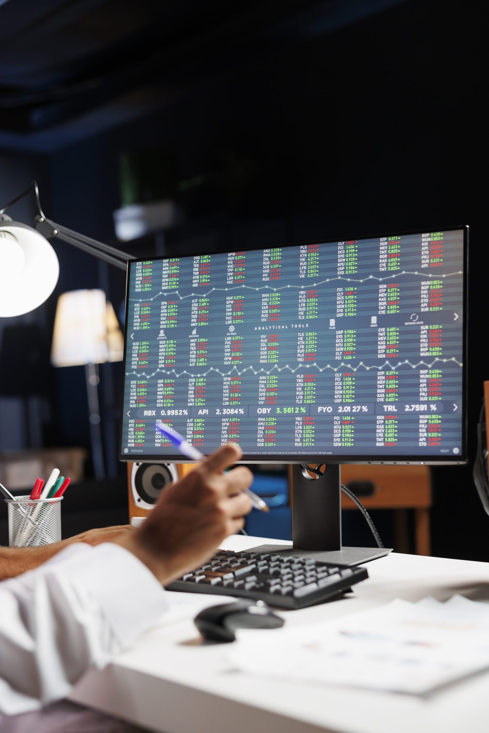 PC monitor displaying financial reports