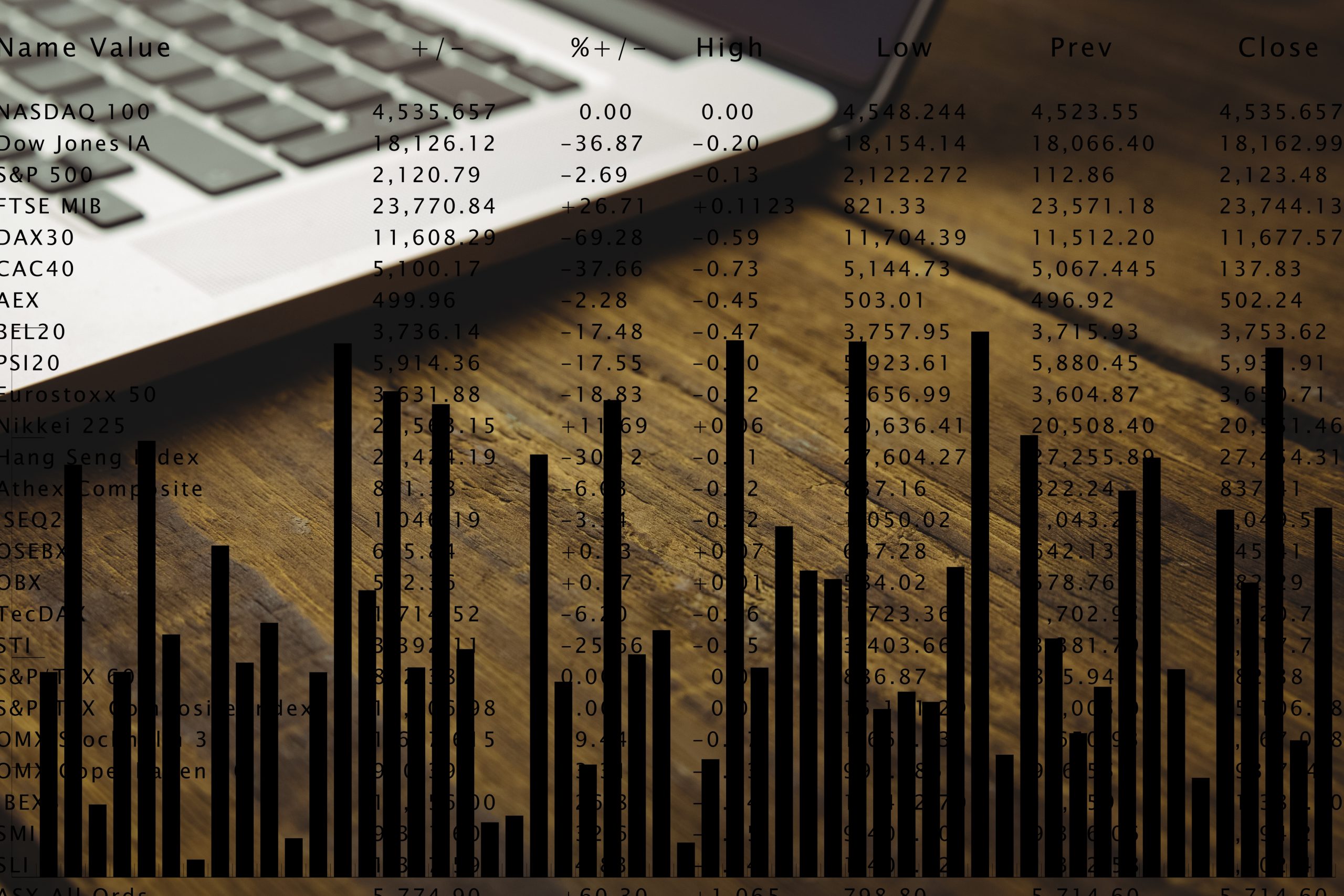 Composite image of laptop on a desk with graphic background